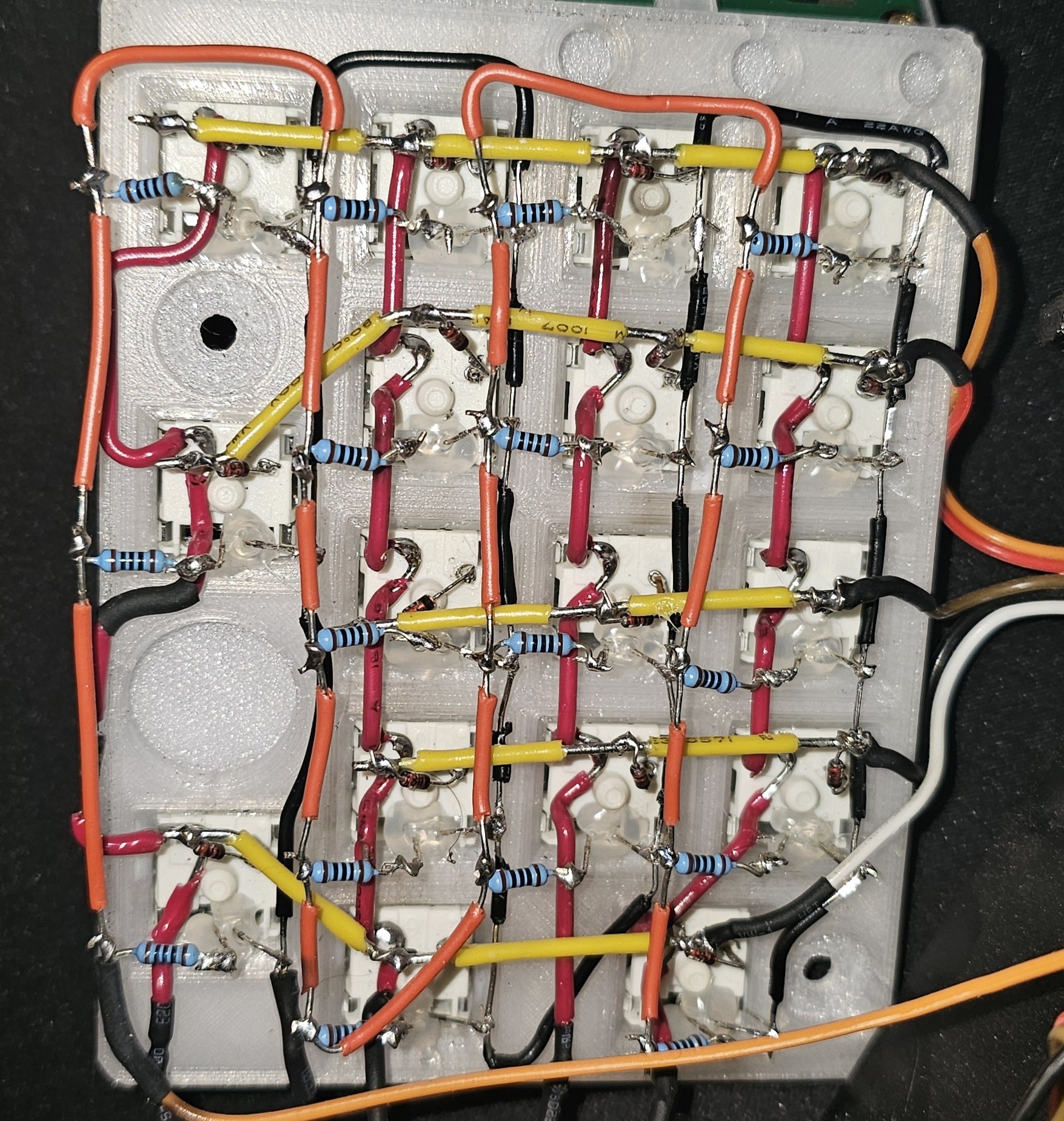 Inside the numpad, the hand-wired 5x4 switch matrix with color-coded wiring and a diode at each key